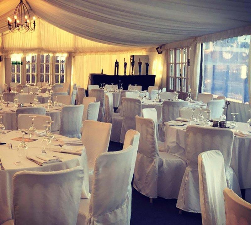 Marquee set and dressed up for a wedding.