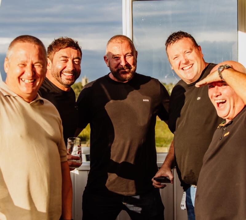 A group of gents in the sunshine enjoying hospitality at Sedgefield Races