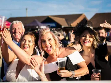 Some of the crowd at Sedgefield Races in the sunshine