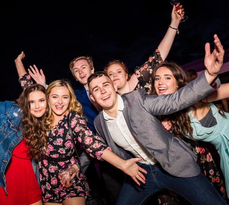 A group of friends enjoying the entertainment at Sedgefield Races